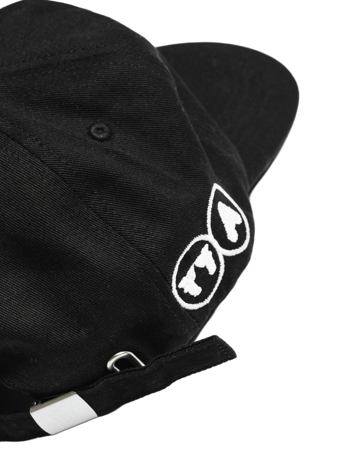 A black low profile five-panel baseball cap with a short brim.